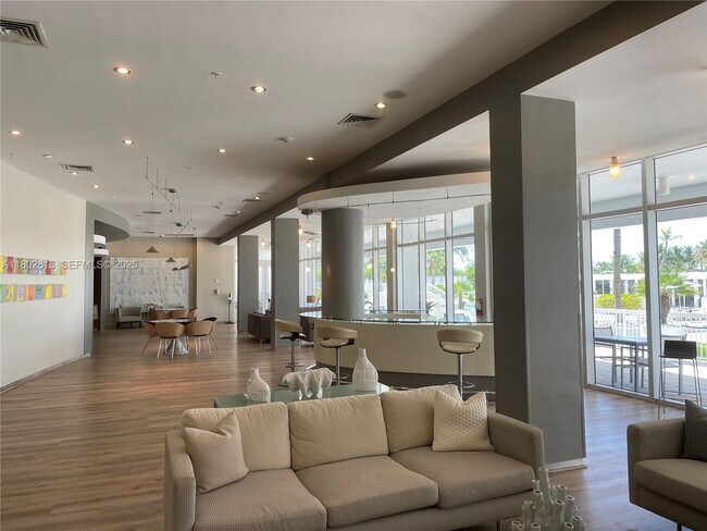 Building Photo - 10275 Collins Ave