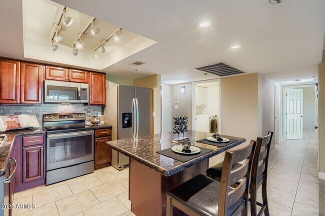 Building Photo - 7970 E Camelback Rd