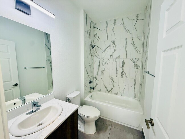 Building Photo - 1295 W 69th St