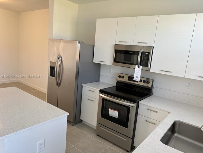 Building Photo - 12235 NW 23rd Ave