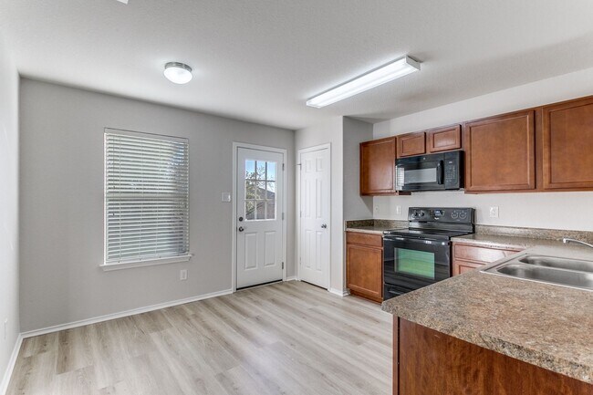 Building Photo - 3/2/2 new flooring and interior paint