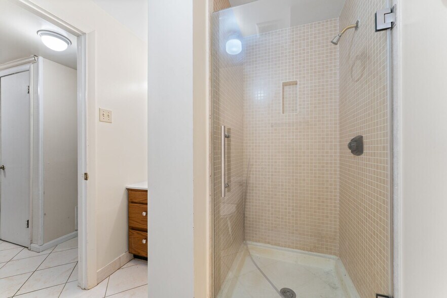 Full-size shower in Lower Level - 9 Snug Hill Ct
