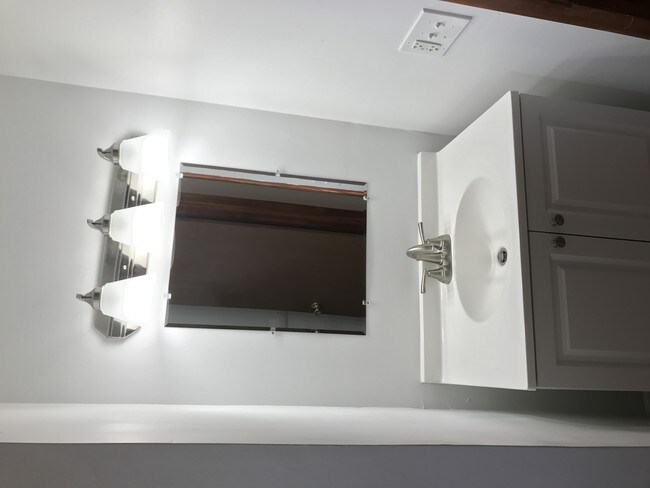 Brand new vanity and mirror in bathroom - 143 Franklin Rd