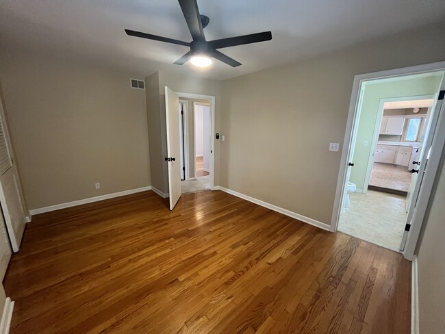 Master bedroom with attached half bathroom - 3007 S 95th St