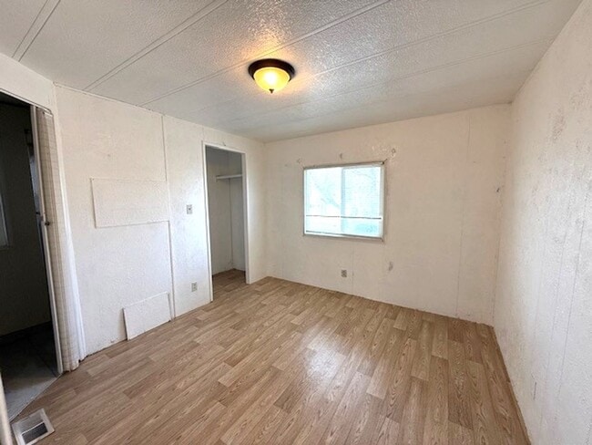 Building Photo - 3 bedroom mobile home with garage and bonus room