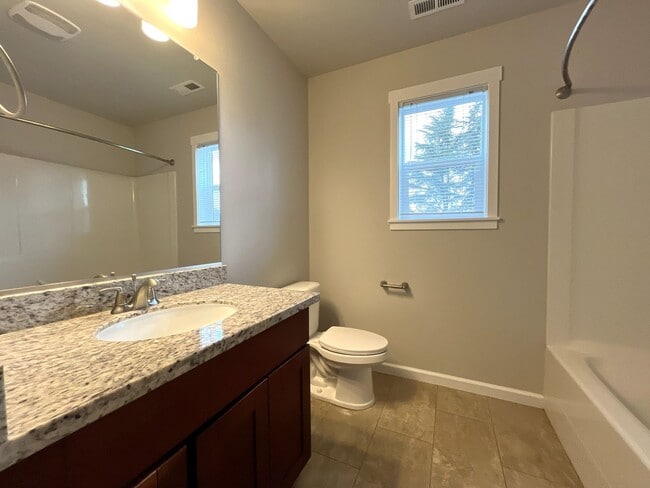 Building Photo - Well-Appointed 4BR/2.5BA Home with Spacious Living Areas & Modern Kitchen