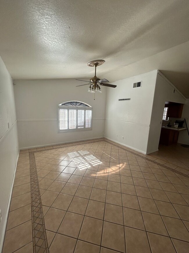 Building Photo - Take a look at this charming single family...