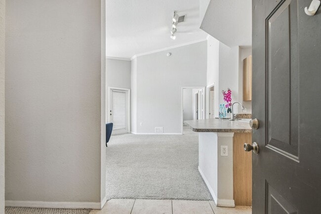 Building Photo - Elegant 1-Bedroom Condo with Lakeside Views in Resort-Style Community