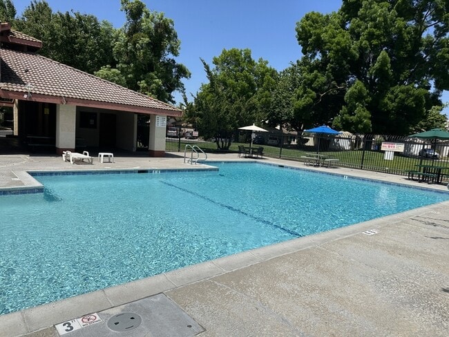 Building Photo - Modesto 3 Bed 2 Bath 2 Car Garage HOA Swim...