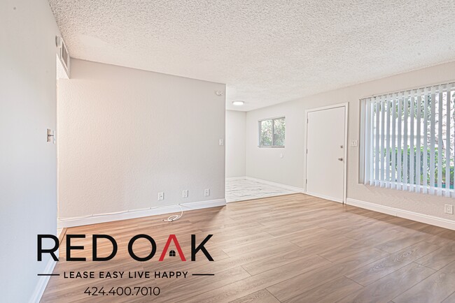 Building Photo - Cheerful One Bedroom with Beautiful Floors...