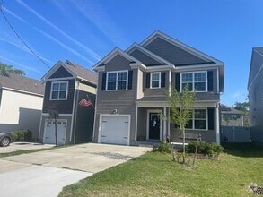 Building Photo - Pack your bags!