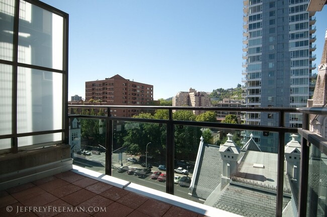 Building Photo - Stunning Penthouse Loft in the Mosaic Condos - Gas Fireplaces, A/C, W/D in unit!