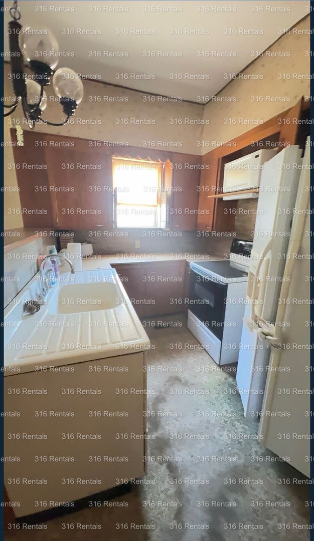 Building Photo - $950 - 4 bed 2 bath - Single Family Home