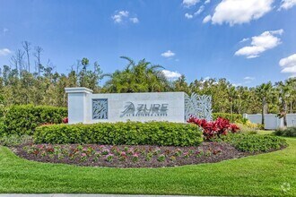 Building Photo - 2/2+Den Coach Home Available Annually!