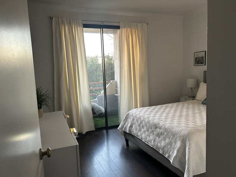 master bedroom with private balcony - 3913 N Virginia Rd