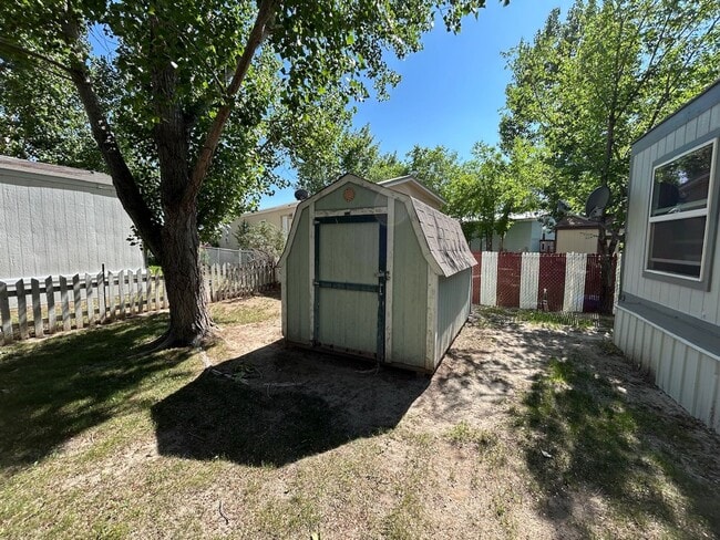 Building Photo - 3 Bed 2 Bath Mobile Home with Fenced Yard and Storage Shed