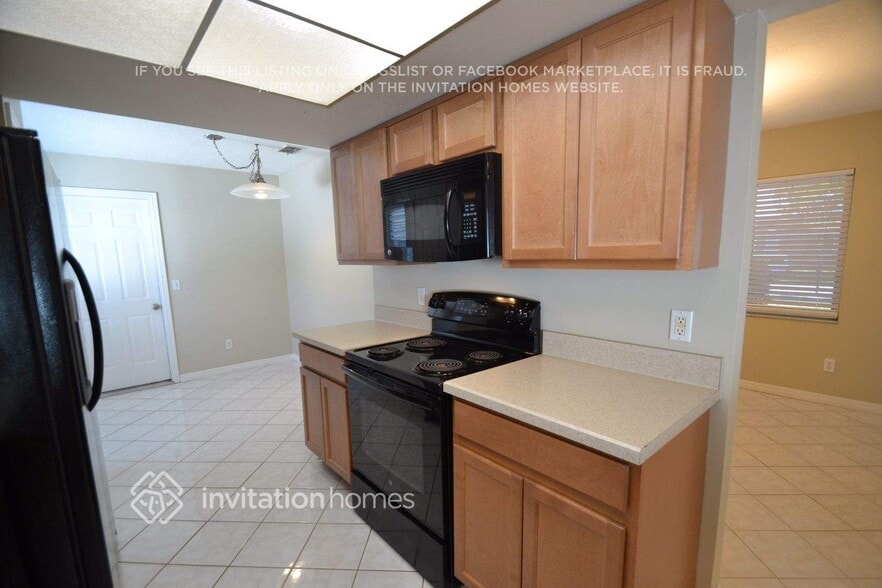 Building Photo - 8643 Tarragon Dr