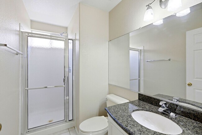 Building Photo - 4 bedroom with NO HOA! New Appliances & New Carpet!
