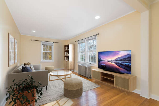 Living room with recessed lighting and hardwood flooring - 317 Washburn Ave