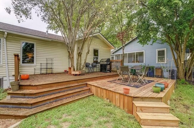Building Photo - Discover Your Austin Oasis: Revitalized Bungalow with Hardwood Floors and Entertainer's Deck!