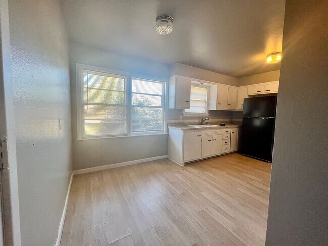 Building Photo - PRE-LEASING FOR JULY! Great 3/2/1 with Two Living Areas