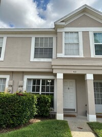 Building Photo - Beautiful Townhome in a gated community wi...