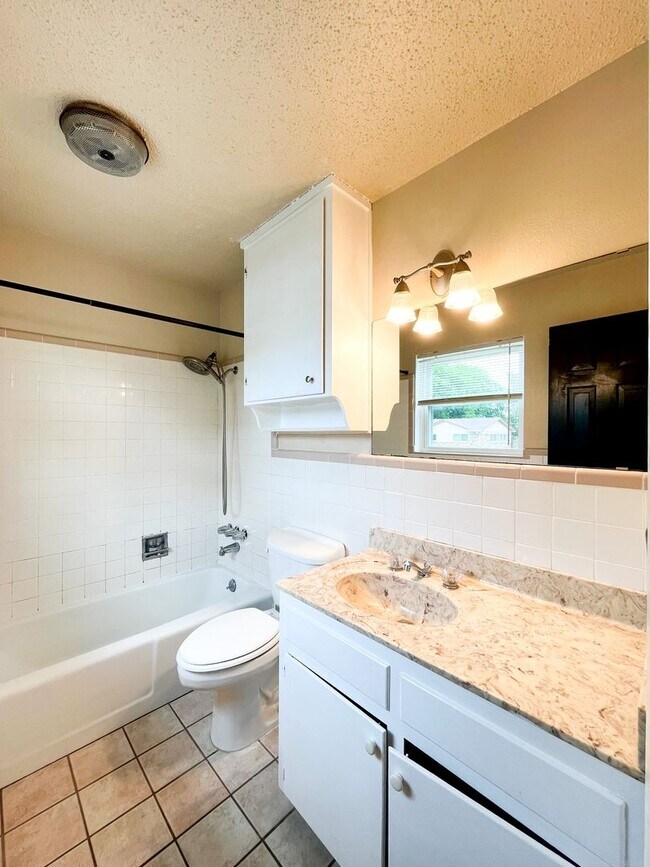 Building Photo - Available Now!!!! Gorgeous 3 bedroom, 2 bath, 2 car garage home. Beautiful wood look flooring. Sp...