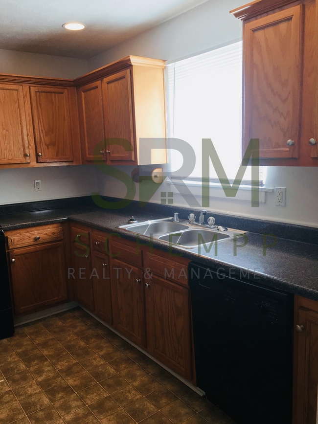 Building Photo - Updated Four Bedroom/Three Full Bath House in Russell Neighborhood! *COMING SOON*