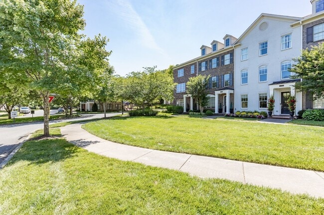 Building Photo - Welcome to this charming end unit townhome
