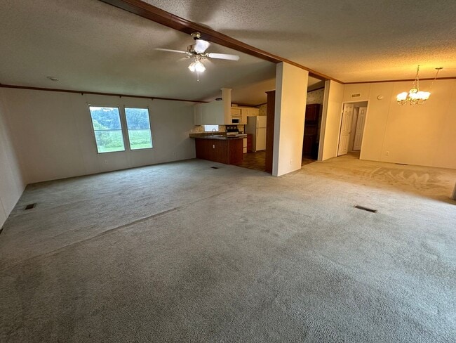 Building Photo - Charm & Commuter Convenience – 3BR/2BA Outside City Limits