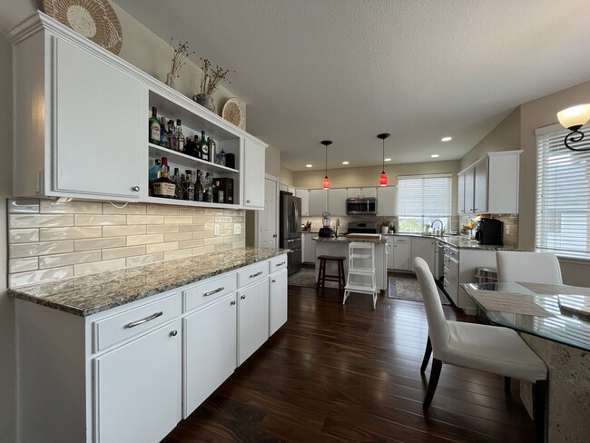 Building Photo - Elegant 5BR + Bonus Room Home with Bay Windows, Entertainment Room & Oversized Primary Retreat