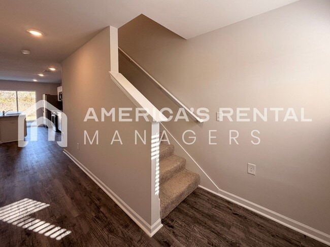 Building Photo - Spacious Two-Story Townhome with Open Layout!