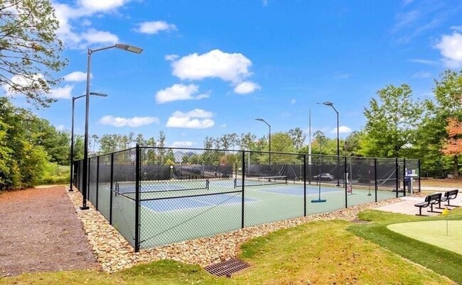 Building Photo - Charming Townhome with Open Layout, Back Patio & One-Car Garage – Near RTP, RDU & Everyday Conven...