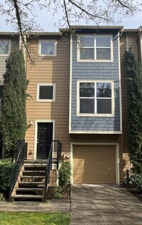 Building Photo - Beautiful 2 Bedroom Townhome with Walk-In Closets Private Deck & Attached Garage