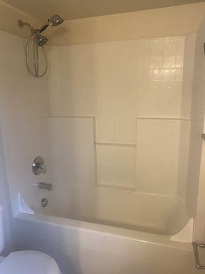 Building Photo - LIKE NEW three bedroom with fantastic updates, one car garage and private newly fenced front patio!