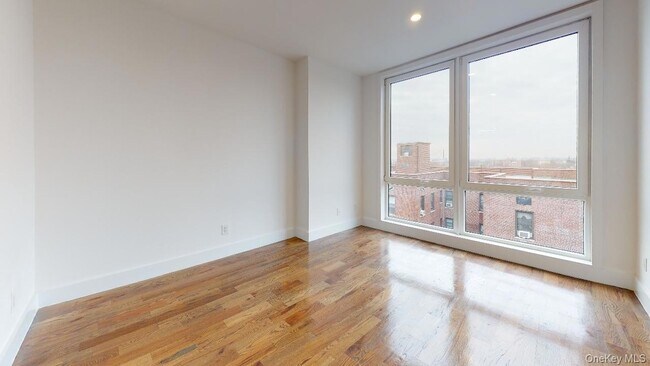 Building Photo - 138-28 Queens Blvd