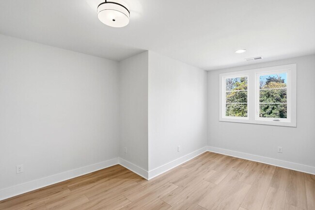 Building Photo - Bishop at Briar Creek, an end-unit townhome