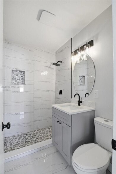 Building Photo - 1400 NE 43rd Ct