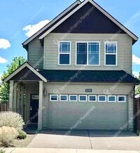 Building Photo - 3  BR home with new flooring in a great NE...