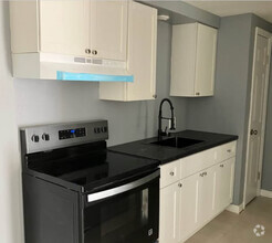 Building Photo - 6640 Veterans Dr