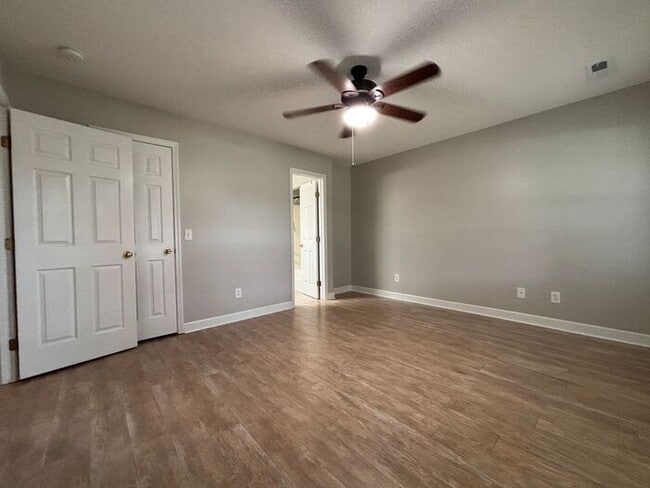Building Photo - You will LOVE the fenced yard!