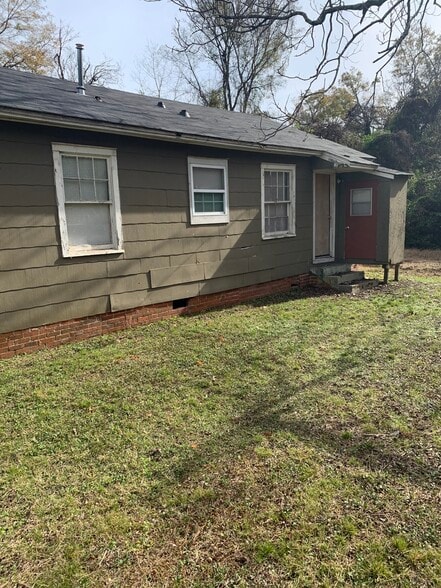 Outside back showing door/room for the dryer - 375 Columbus St