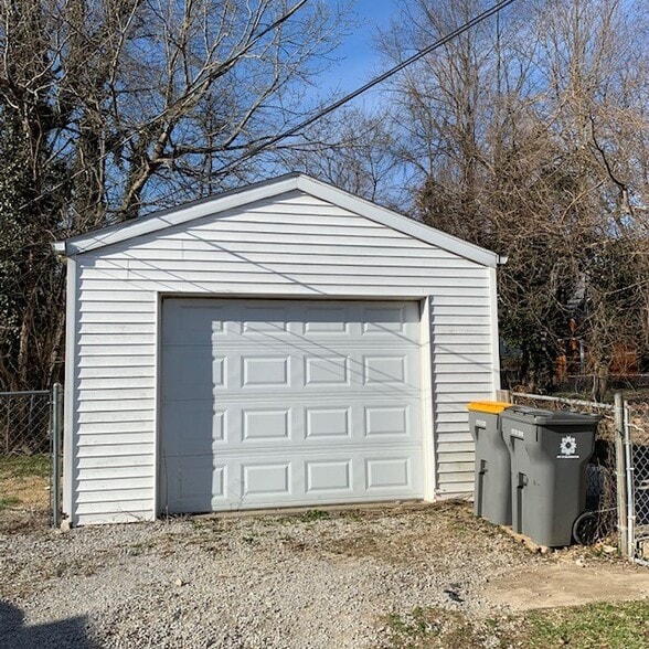 Detached one car garage with fenced yard. - 209 E Vermilya Ave