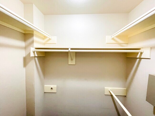 Walk-in "Hers" closet off primary bedroom - 14511 Enola Dr