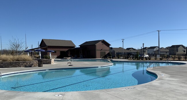 Beautiful pool and bathhouse for residents at Villages at Hunters Point - 9010 Fenton Rd.