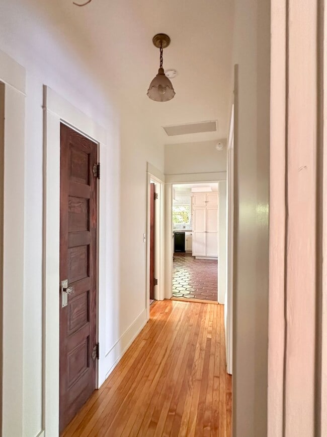 Building Photo - Meticulously Restored 1920s Craftsman on a Private, Hedged Lot | Pet Friendly!