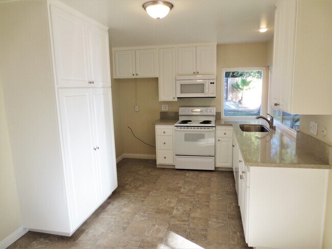 Building Photo - Updated Single Family Home with Over-sized...