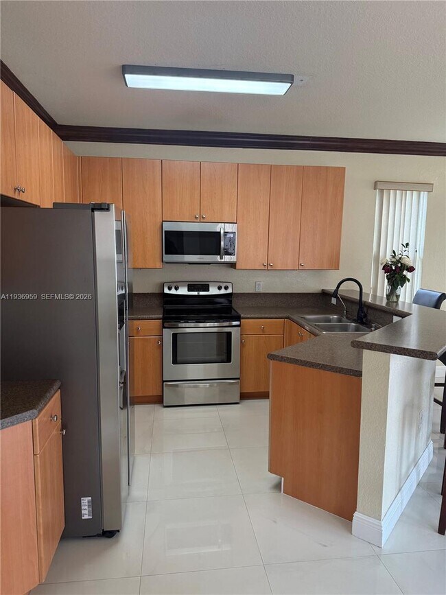 Building Photo - 3951 NE 13th Dr