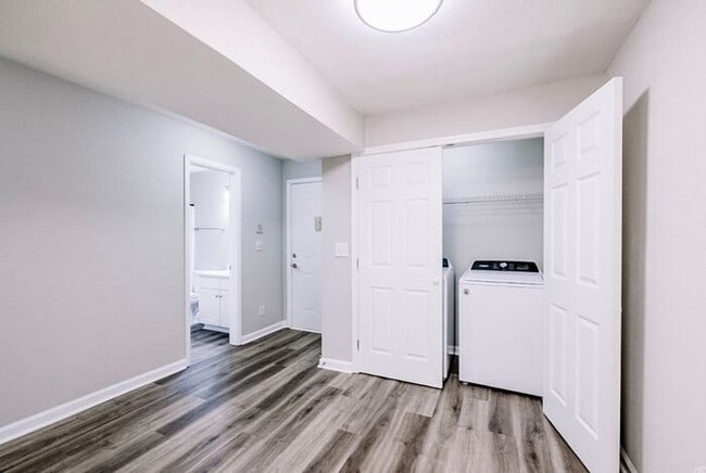 Building Photo - Spacious 2-Bedroom Elite Apartment with Private Balconies & Washer/Dryer
