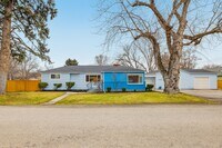 Building Photo - Charming 4 Bed, 2 Bath Home with 2 Shops i...